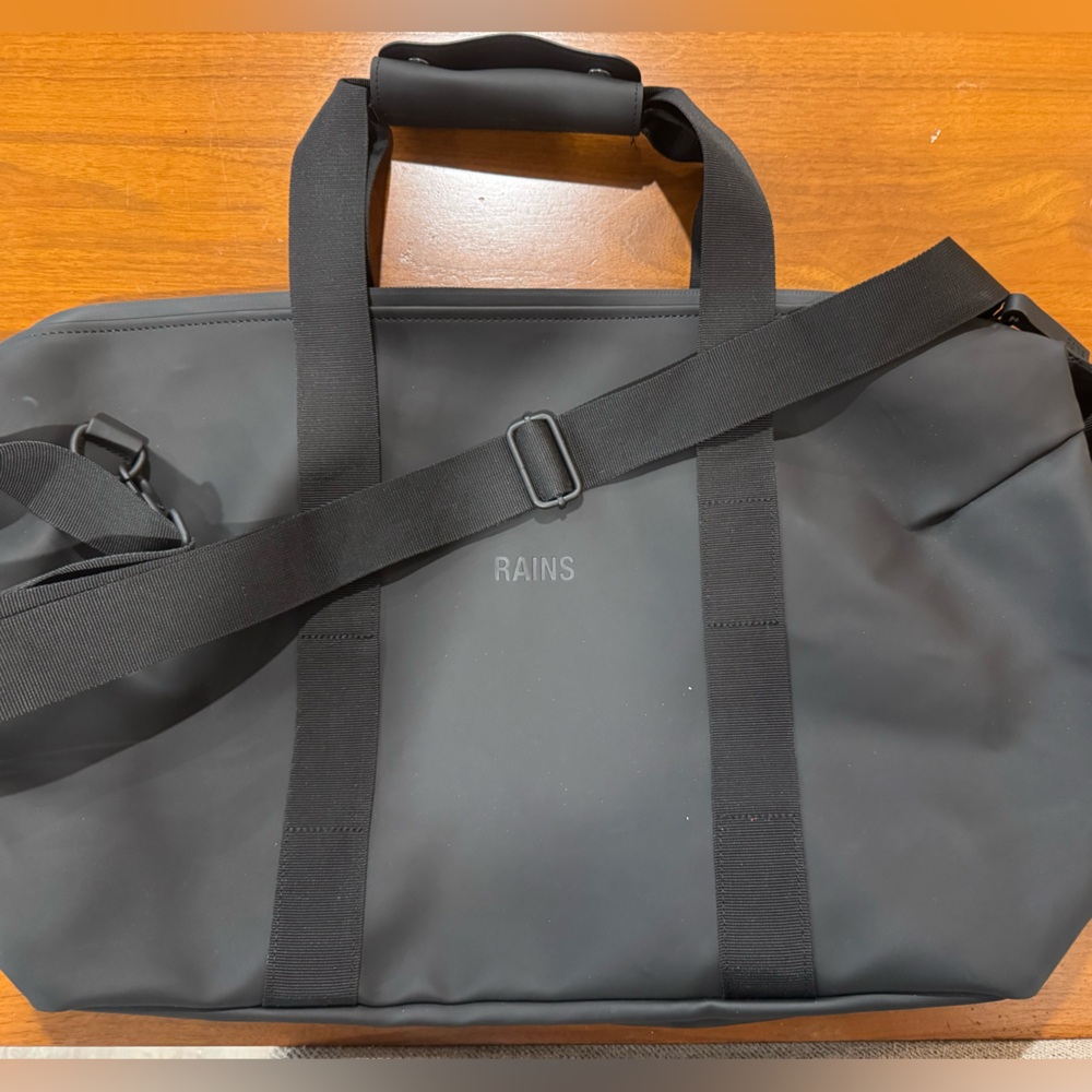 Rains Black Duffel Bag for Men